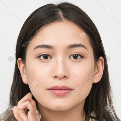 Neutral white young-adult female with long  brown hair and brown eyes