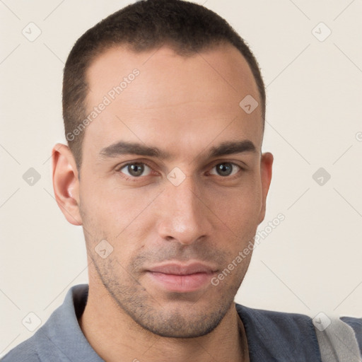 Neutral white young-adult male with short  brown hair and brown eyes