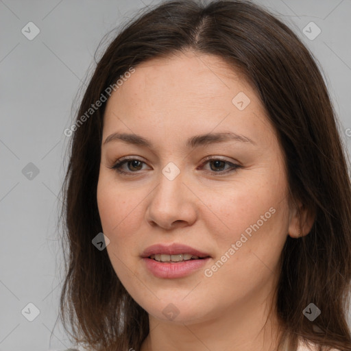 Joyful white young-adult female with medium  brown hair and brown eyes