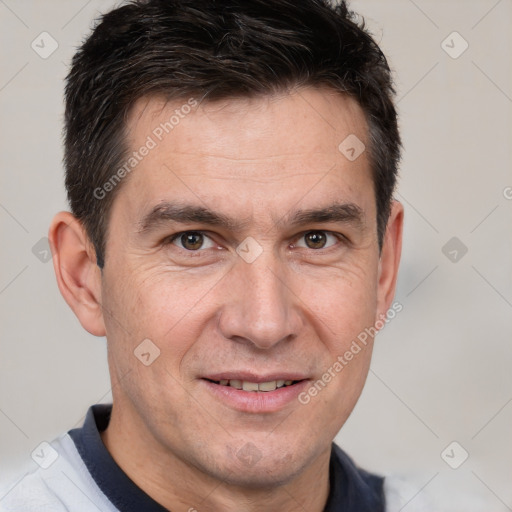 Joyful white adult male with short  brown hair and brown eyes