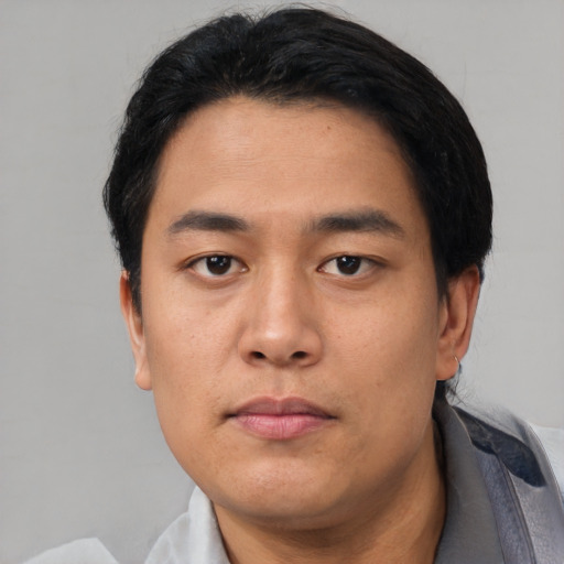 Neutral asian young-adult male with short  black hair and brown eyes