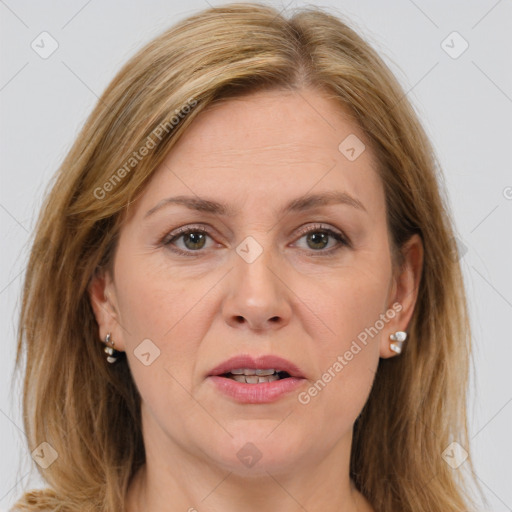 Joyful white adult female with medium  brown hair and brown eyes