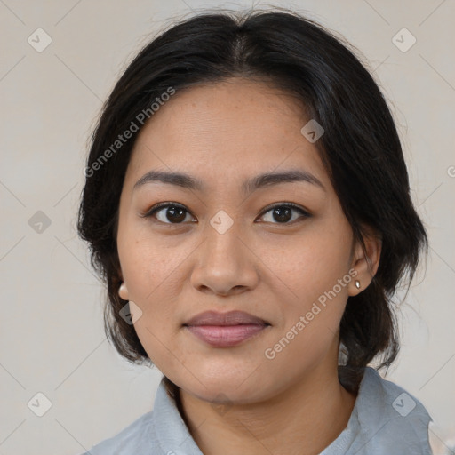 Joyful asian young-adult female with medium  brown hair and brown eyes