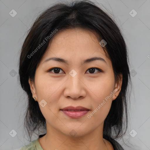 Joyful asian young-adult female with medium  brown hair and brown eyes