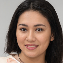 Joyful white young-adult female with medium  brown hair and brown eyes