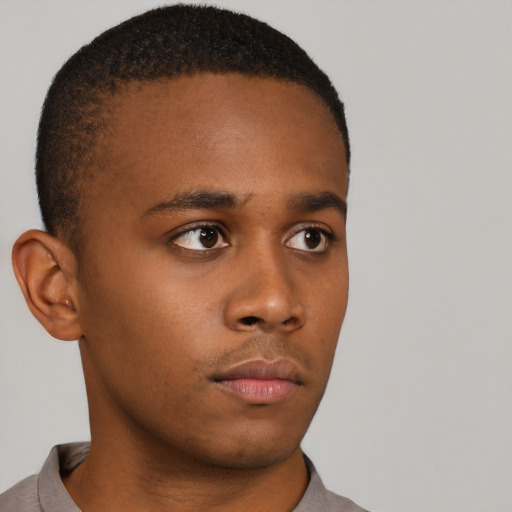 Neutral black young-adult male with short  brown hair and brown eyes