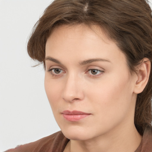 Neutral white young-adult female with medium  brown hair and grey eyes