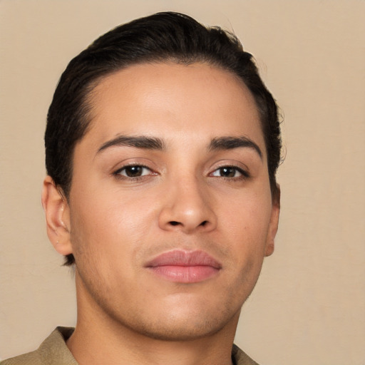 Neutral latino young-adult male with short  brown hair and brown eyes