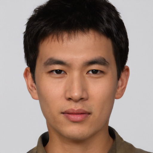 Neutral asian young-adult male with short  brown hair and brown eyes