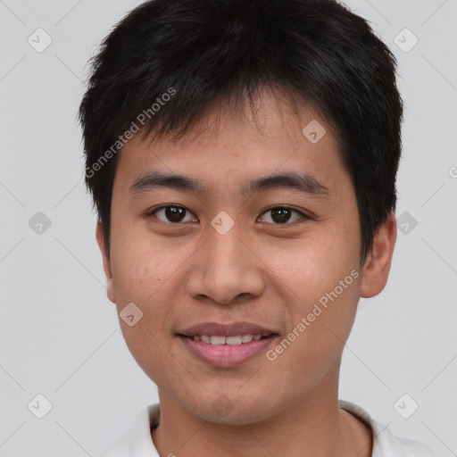 Joyful asian young-adult male with short  brown hair and brown eyes