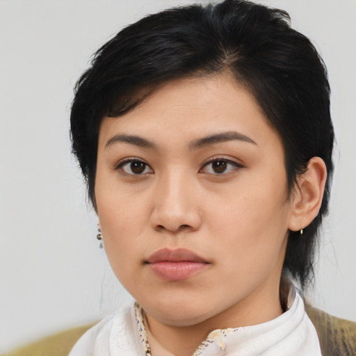 Neutral asian young-adult female with medium  brown hair and brown eyes