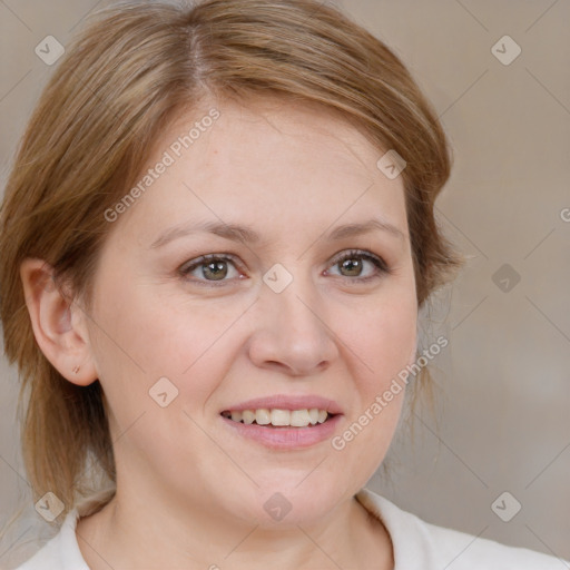 Joyful white young-adult female with medium  brown hair and blue eyes