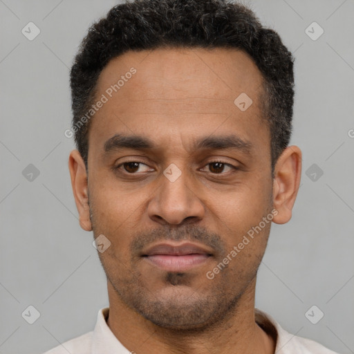 Neutral latino young-adult male with short  black hair and brown eyes