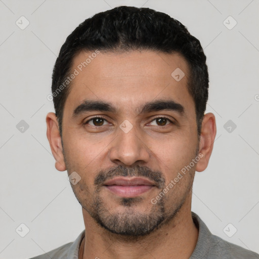 Neutral latino young-adult male with short  black hair and brown eyes