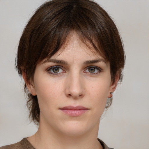 Neutral white young-adult female with medium  brown hair and brown eyes