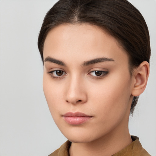 Neutral white young-adult female with medium  brown hair and brown eyes