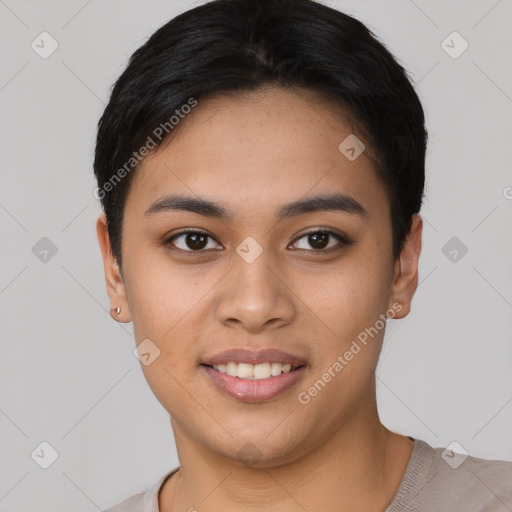 Joyful asian young-adult female with short  black hair and brown eyes