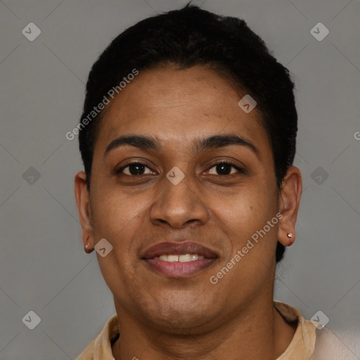 Joyful black adult female with short  brown hair and brown eyes