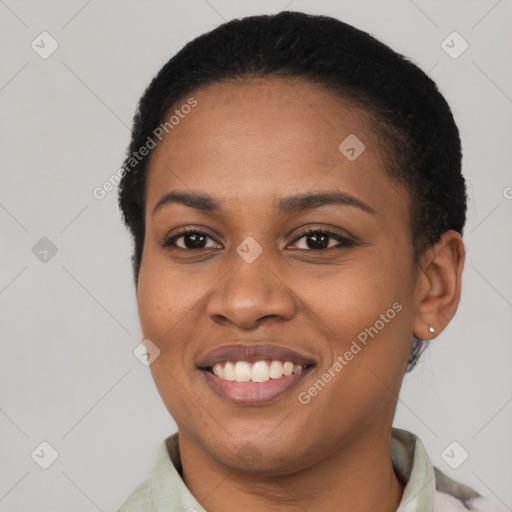 Joyful latino young-adult female with short  brown hair and brown eyes