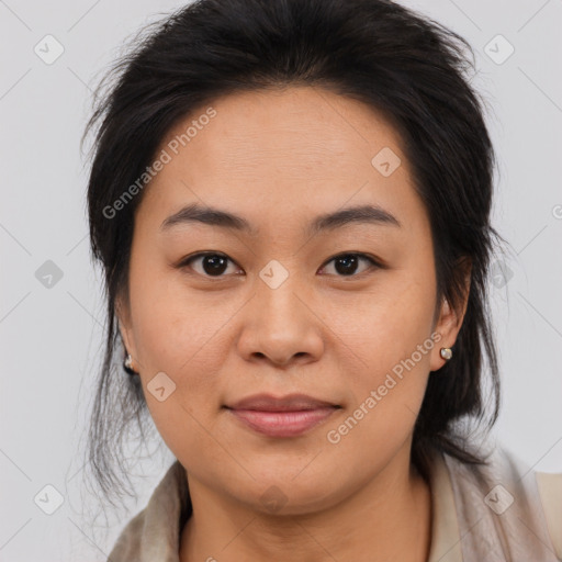 Joyful asian young-adult female with medium  brown hair and brown eyes