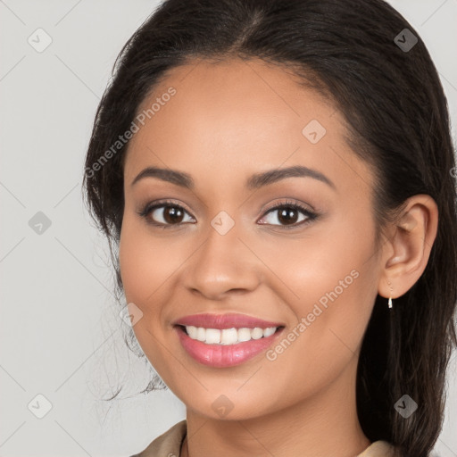 Joyful white young-adult female with long  brown hair and brown eyes