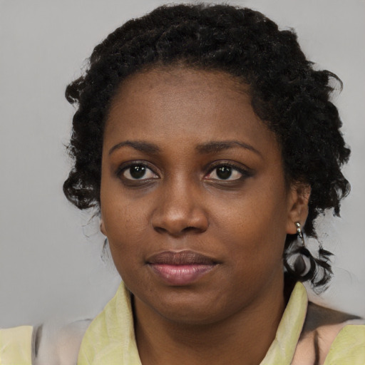 Neutral black young-adult female with medium  black hair and brown eyes