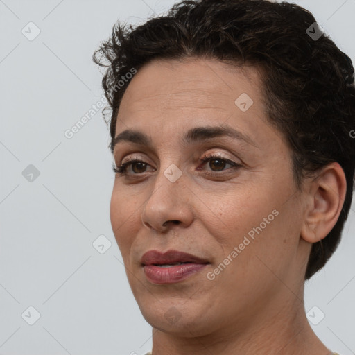 Joyful white adult female with short  brown hair and brown eyes