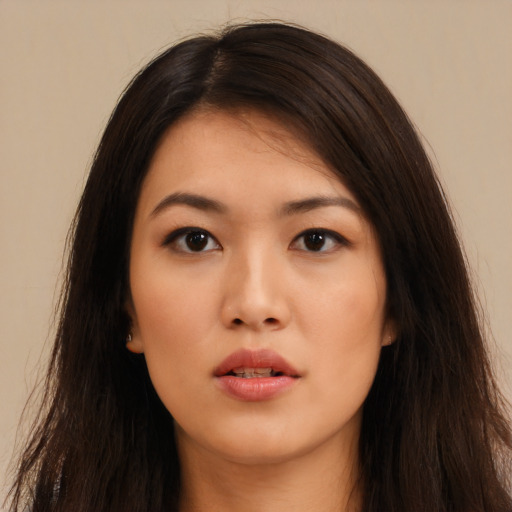 Neutral asian young-adult female with long  brown hair and brown eyes