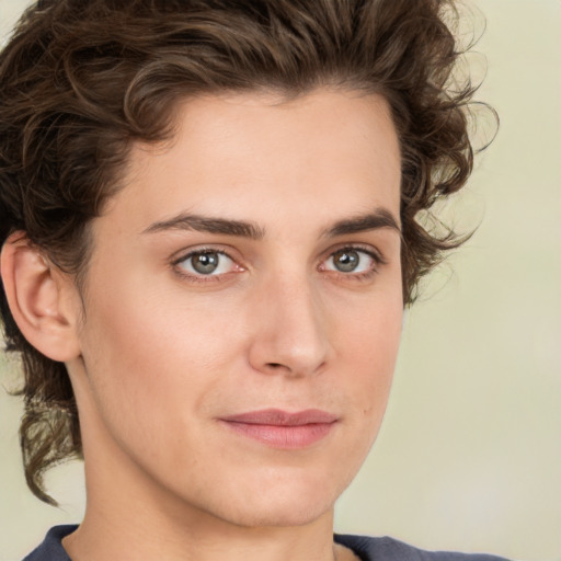 Joyful white young-adult male with medium  brown hair and brown eyes