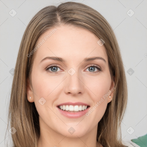 Joyful white young-adult female with long  brown hair and grey eyes