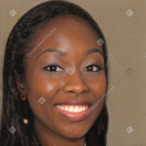 Joyful black young-adult female with long  brown hair and brown eyes