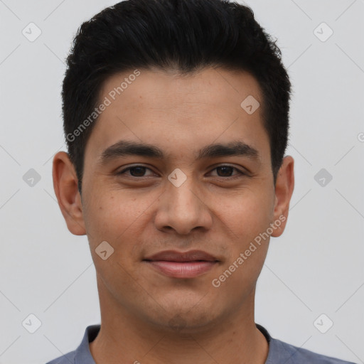 Joyful latino young-adult male with short  black hair and brown eyes