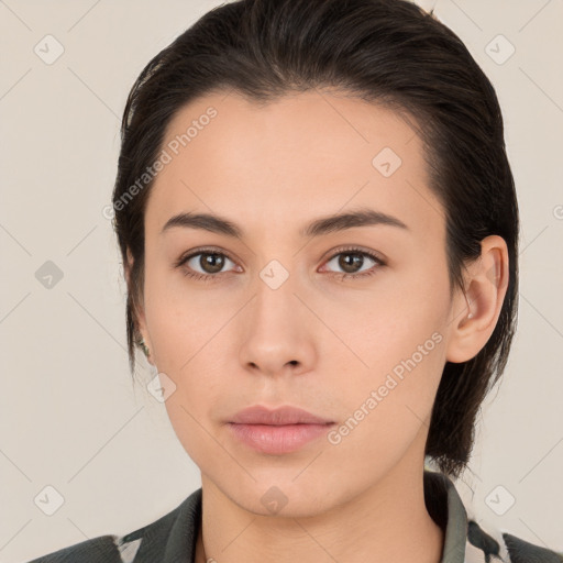 Neutral white young-adult female with medium  brown hair and brown eyes