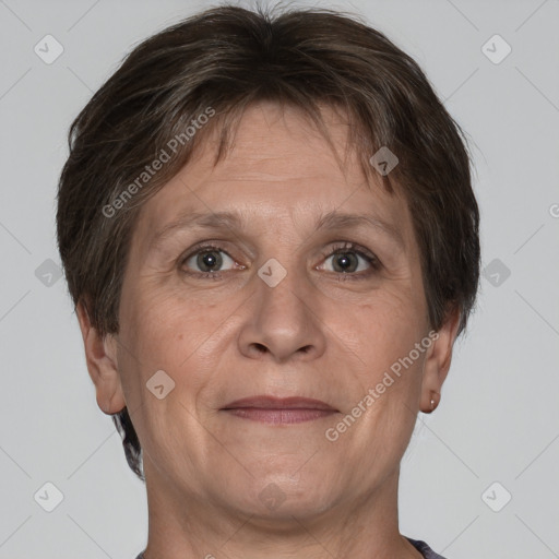 Joyful white adult female with short  brown hair and brown eyes