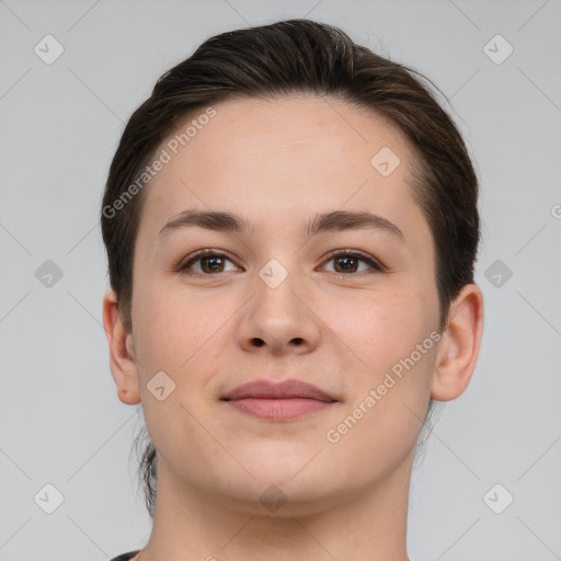 Joyful white young-adult female with short  brown hair and brown eyes