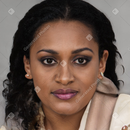 Joyful black young-adult female with long  brown hair and brown eyes