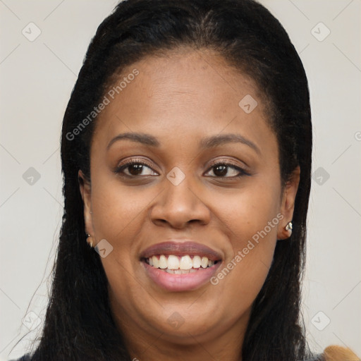 Joyful latino young-adult female with long  brown hair and brown eyes