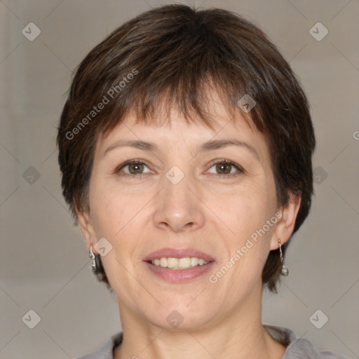 Joyful white adult female with short  brown hair and brown eyes