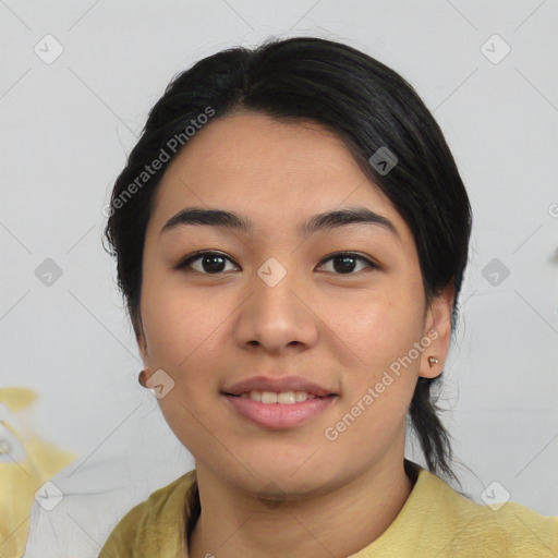 Joyful asian young-adult female with medium  black hair and brown eyes