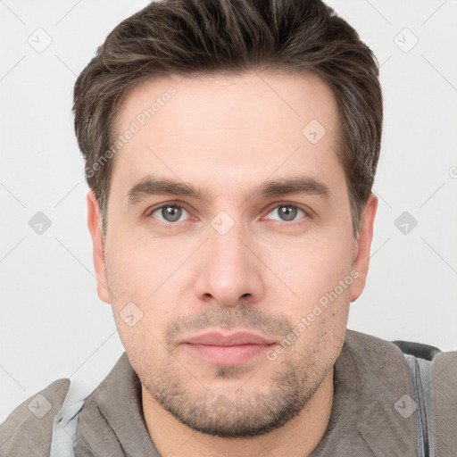 Neutral white young-adult male with short  brown hair and brown eyes