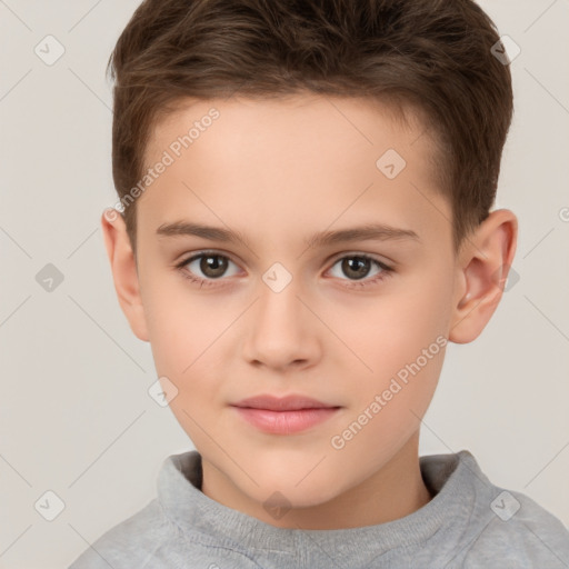 Joyful white child male with short  brown hair and brown eyes