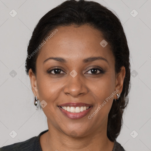 Joyful latino young-adult female with medium  brown hair and brown eyes