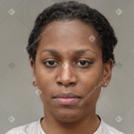 Neutral black young-adult female with short  brown hair and brown eyes