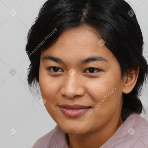 Joyful asian young-adult female with medium  brown hair and brown eyes