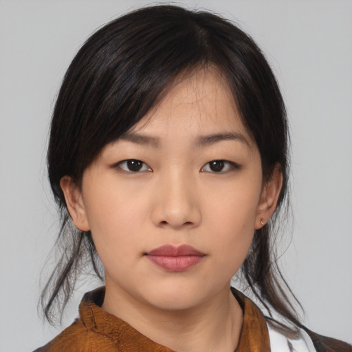 Neutral asian young-adult female with medium  black hair and brown eyes