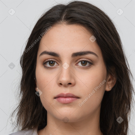 Neutral white young-adult female with long  brown hair and brown eyes