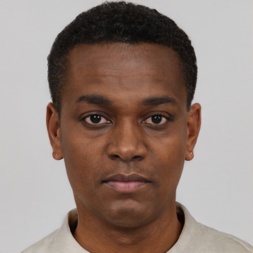 Neutral black young-adult male with short  black hair and brown eyes