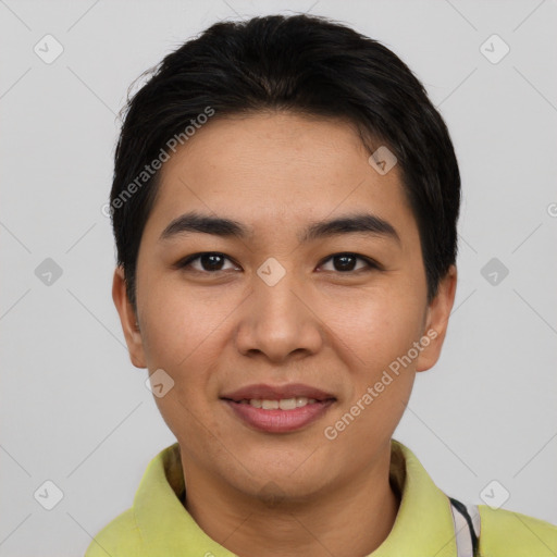 Joyful asian young-adult male with short  black hair and brown eyes