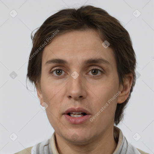 Joyful white adult female with short  brown hair and brown eyes