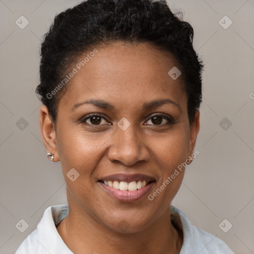 Joyful black young-adult female with short  brown hair and brown eyes